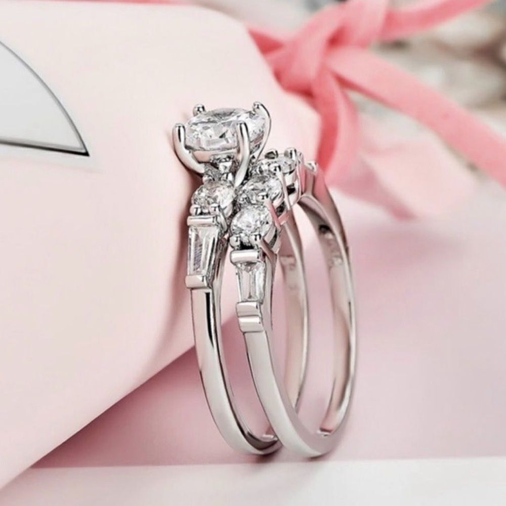 The Delicate Engagement set. 925 silver and lab created stones. Sz 6